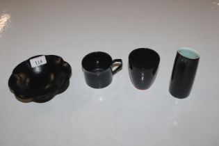 A collection of black glazed Studio ware to includ