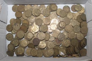 A box of three pence pieces