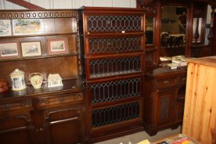 A five section Globe Wernicke bookcase enclosed by