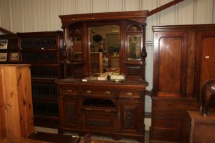 A late Victorian carved mahogany mirror back sideb