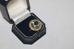 A large silver gilt and citrine set ring