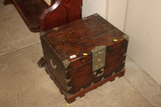 A Chinese chest with white metal carrying han