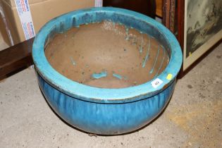 A large blue glazed planter, approx. 51cm dia. x 3