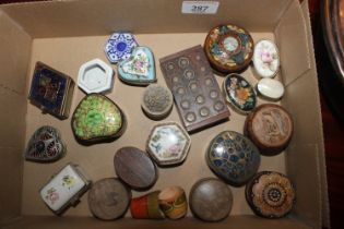 A collection of various decorative pin boxes