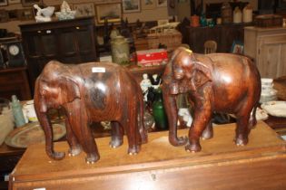 A pair of carved hardwood elephants