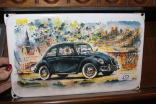 An enamel plaque of a Volkswagen Beetle