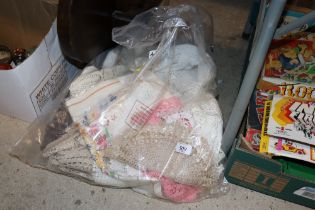 A bag of assorted lace and linen