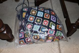 A hand crochet blanket, approx. 76cm x 87cm