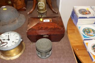 A Georgian sarcophagus shaped tea caddy; and a pew