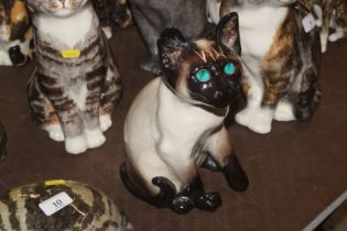 A Winstanley Pottery model of a Siamese cat with g