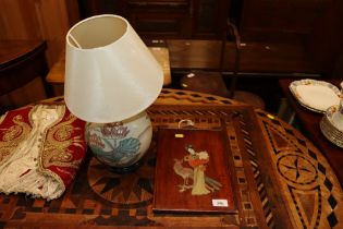 An Oriental decorated table lamp and shade togethe