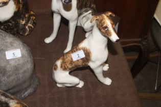 A Winstanley Pottery model of a whippet with glass
