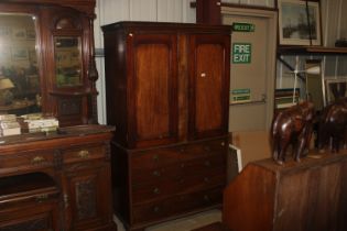 A 19th Century mahogany linen press converted top