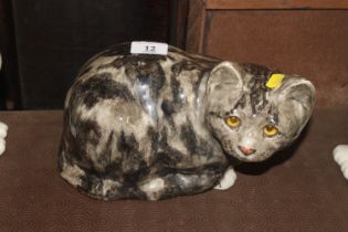 A Winstanley Pottery model of a cat with glass eye