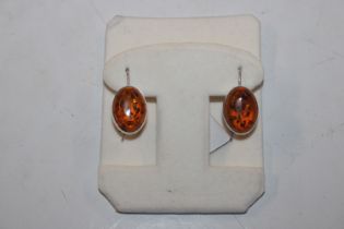 A pair of large Sterling silver and amber drop ear