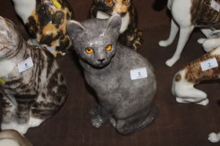 A Winstanley Pottery model of a cat with glass eye