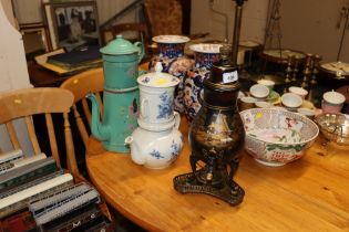 A Dutch decorated pewter coffee pot on stand toget