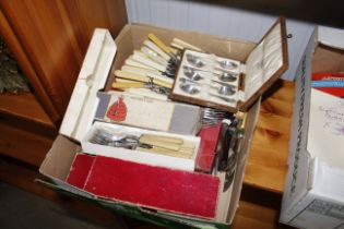 A tray box of various cutlery
