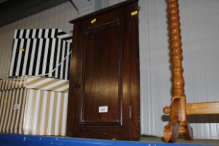 A mahogany hanging corner cupboard