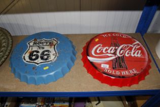 Two bottle top signs