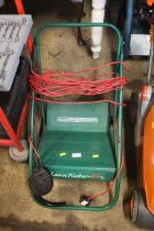 An electric lawn raker 30 scarifier