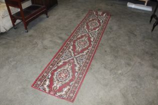 An approx. 9' x 2' Eastern style runner