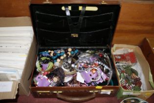 A small leather attaché case and contents of vario