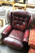 A brown leather reclining chair