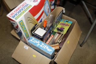 A box of miscellaneous children's games