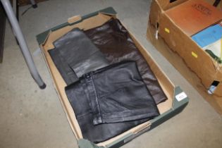 Three leather skirts