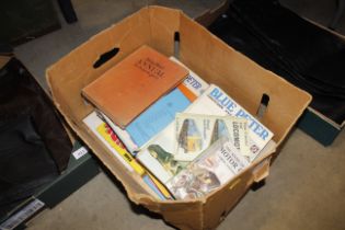 A box of miscellaneous books to include Blue Peter