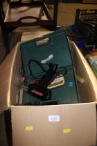 A box of various hand tools to include mallet, wir