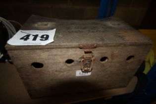 A wooden ferret box