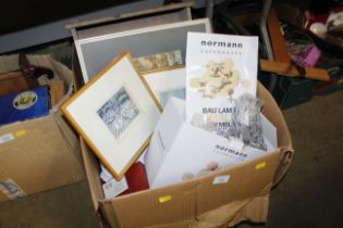 A box of miscellaneous prints, light fittings etc.