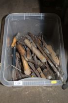 A box containing various hand tools to include dri