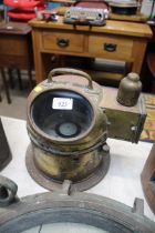 A ship's brass binnacle hood gimbal compass