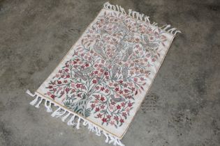 An approx. 2'11" x 2' Suzani style wall hanging