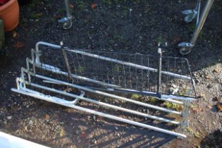 An extending scissor effect roof rack and a car