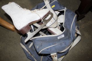 A pair of ice skates in carrying bag