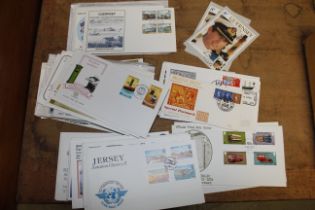 A box of assorted First Day Covers