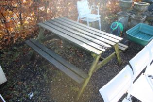 A wooden picnic bench