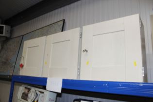 Three painted wall cabinets