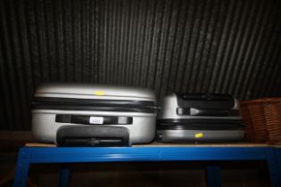 Two plastic travel cases