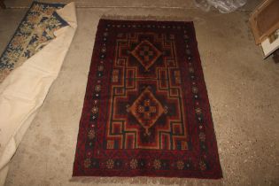 An approx. 4'3" x 2'8" Baluchi rug