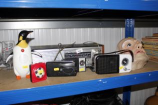 A Roberts radio, three transistor radios, a novelt