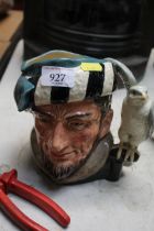 A Royal Doulton character jug of a falconer