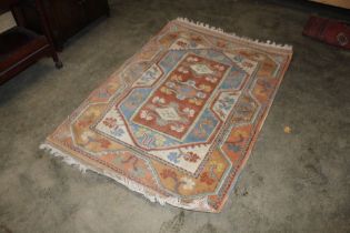 An approx. 6' x 4' Eastern patterned rug AF