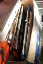 A mitre saw, two hand saws, a pair of jump leads, a