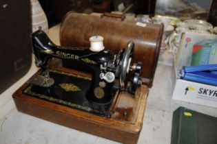 A Singer sewing machine in case