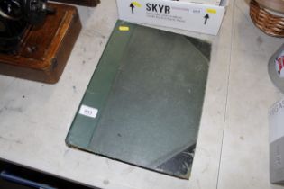 A scrap book and contents of 20th Century engravin